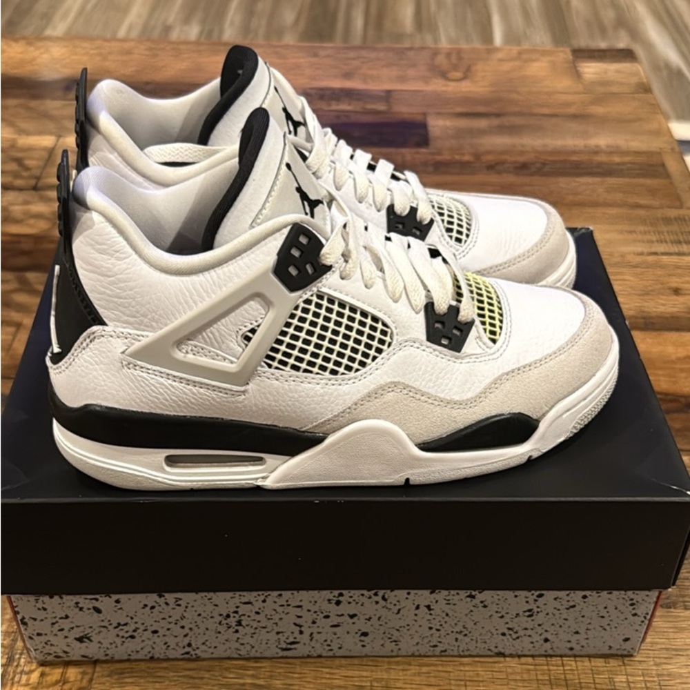 Air Jordan Retro 4 in White, Black, and Gray 6.5Y